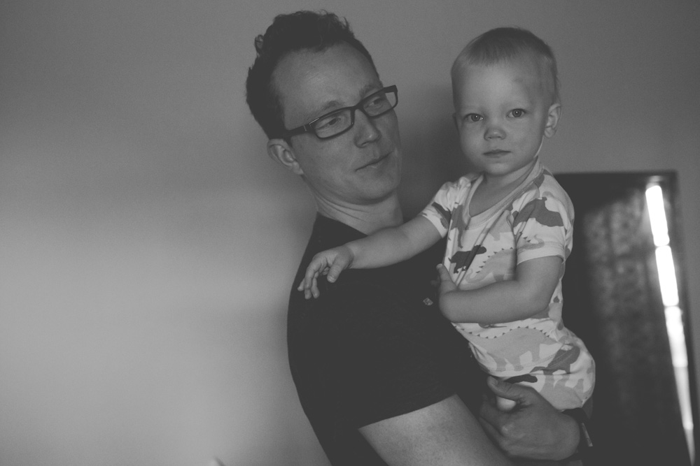 documentary family photography - toddler with dad waking up